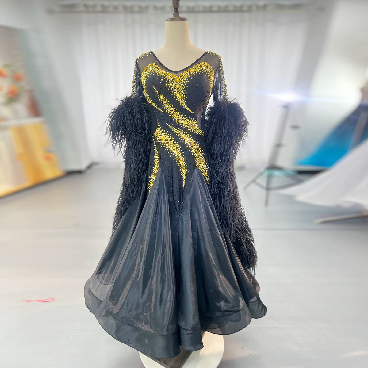 Custom Black and Gold Ballroom Competition Dress with Feathers